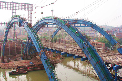 六企业南宁八尺江大桥钢管拱节全面合拢